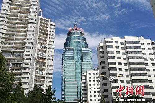 资料图：北京市亚运村北辰附近某小区楼外景。<a target='_blank'  data-cke-saved-href='http://www.chinanews.com/' href='http://www.chinanews.com/' >中新网</a> 程春雨 摄